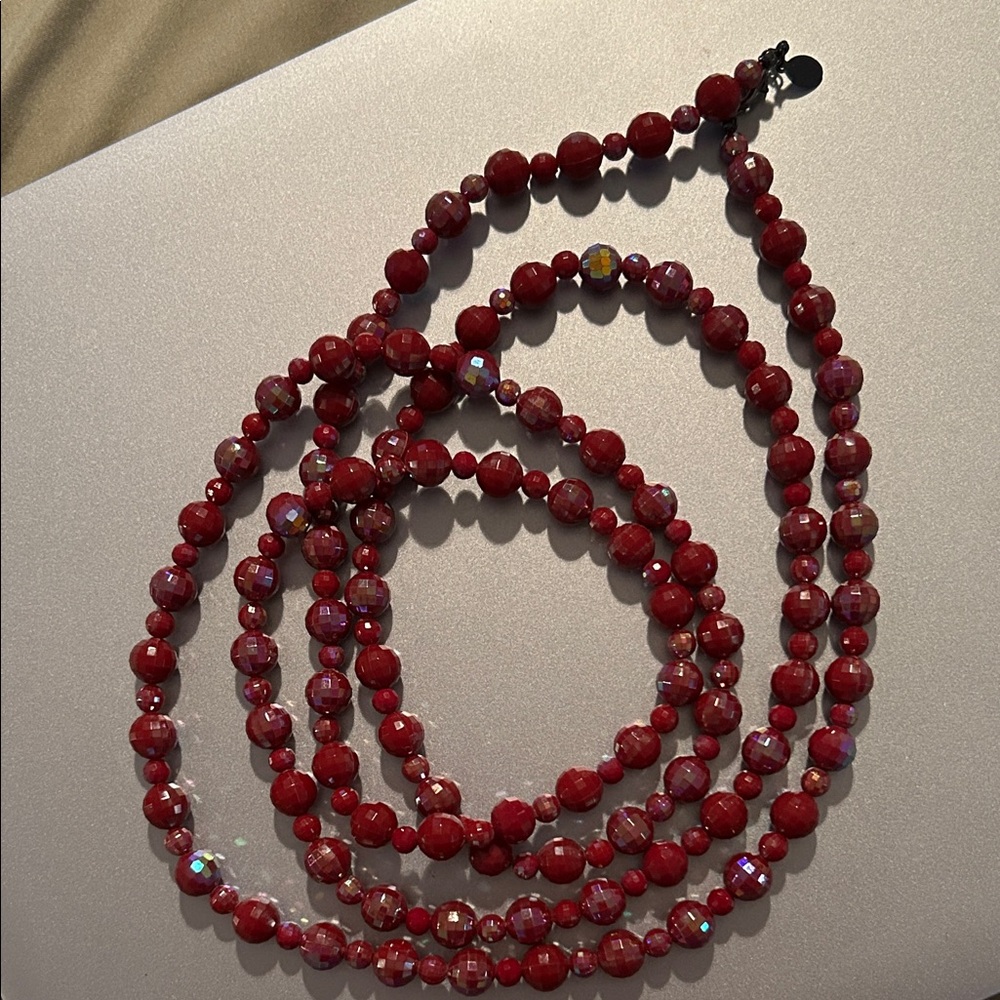 Long red bead necklace
